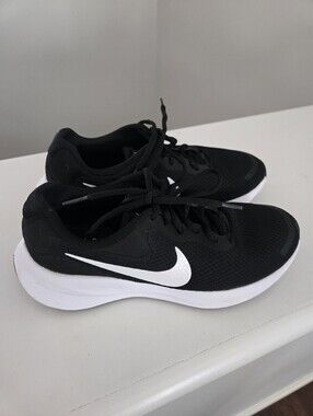Nike Revolution Black & White Athletic Sneakers with Signature Swoosh